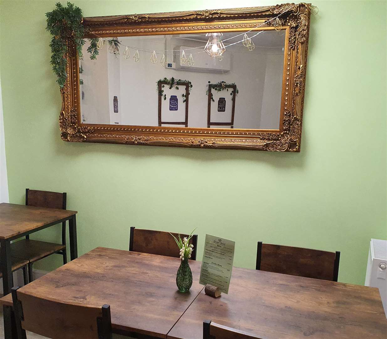 The interior of the Green Bowl incudes seating at the back of the café