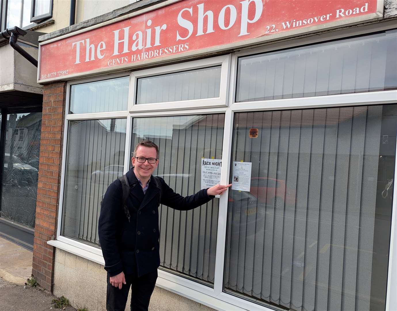 High street champion Graham Soult spots a poster advertising his upcoming talk on Winsover Road during a recent trip to Spalding