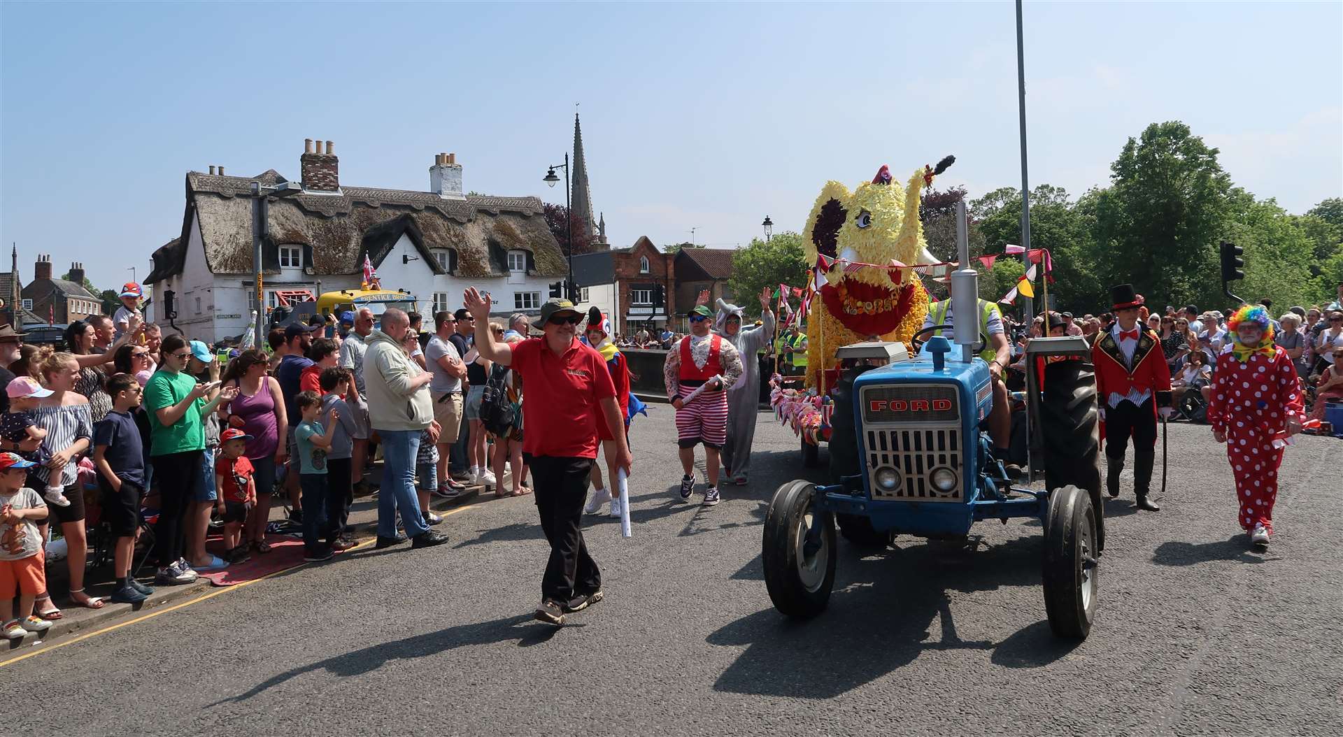 The White Horse and parish church made for a picturesque backdrop for the parade. Photo: Lorna O'Dwyer