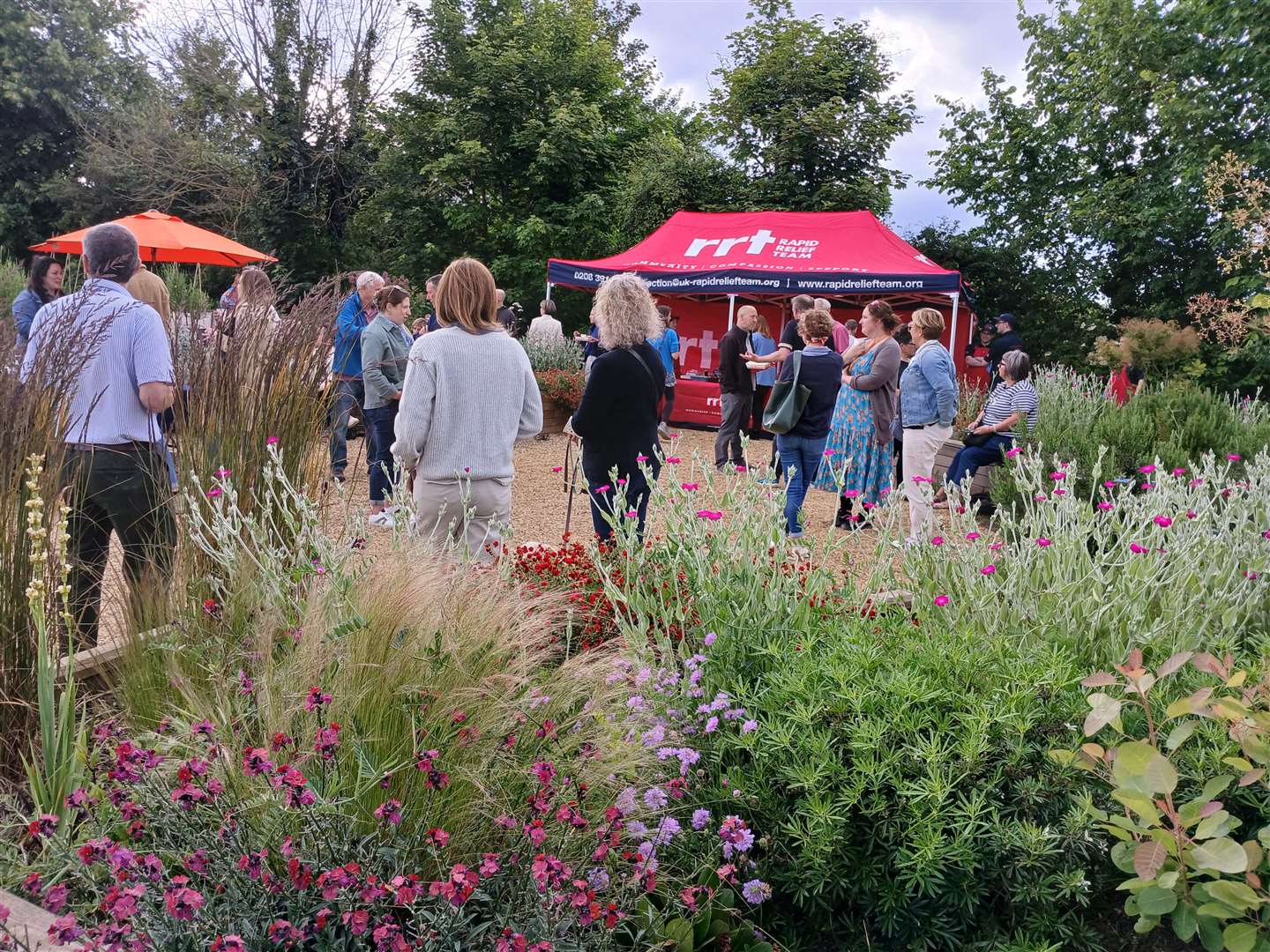 Volunteers and trustees for the MindSpace charity gathered at the charity's Wellbeing Garden at the Uffington Road Allotments