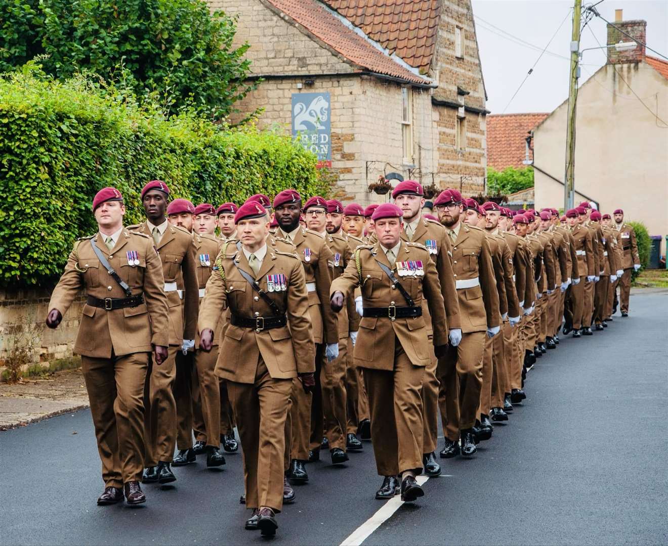 The 216 (Parachute) Signal Regiment marched through the village on Sunday. Photo: Deborah Knowles