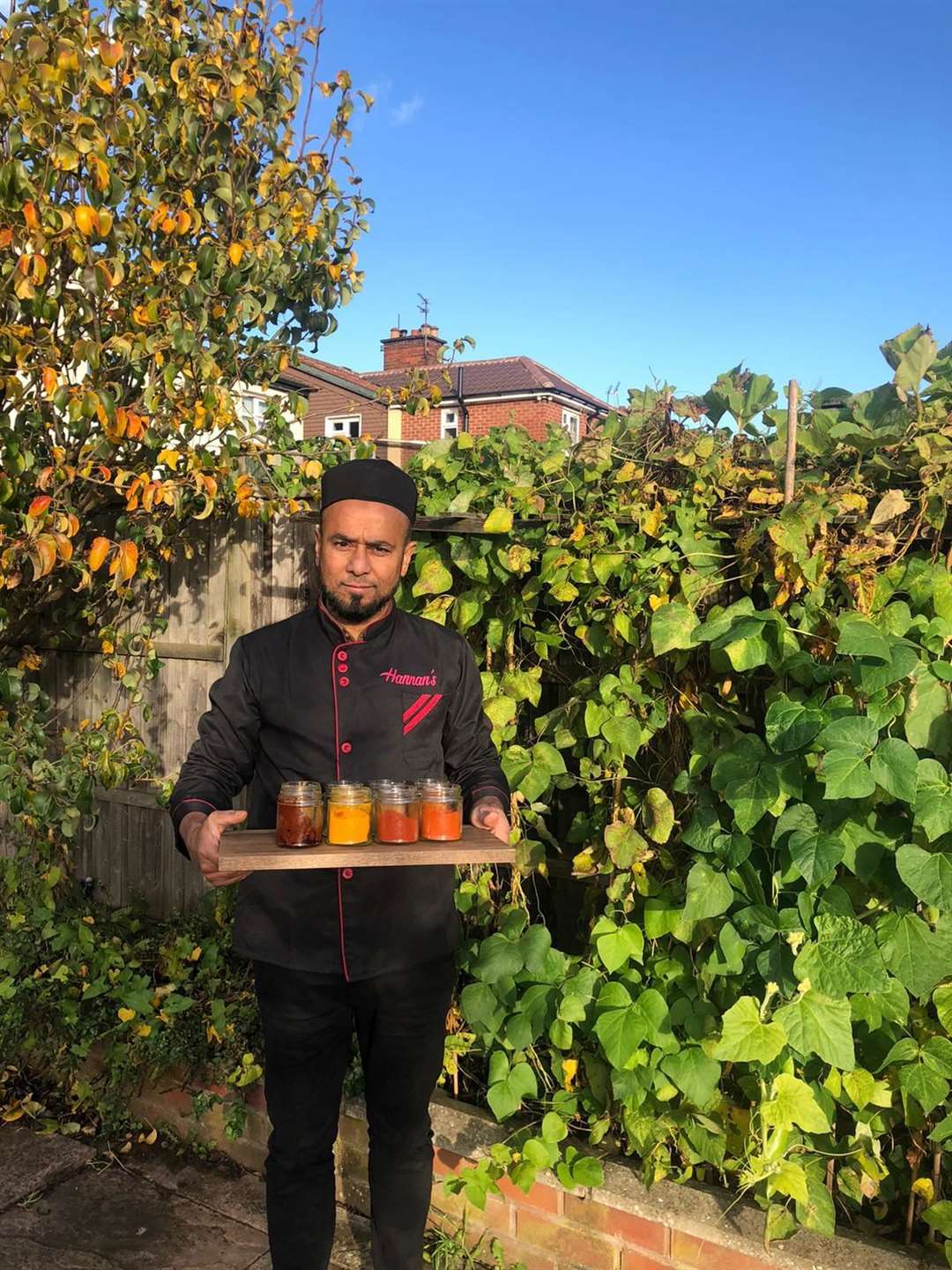 Abdul Hannan in his garden at home where he grows produce for his cooking