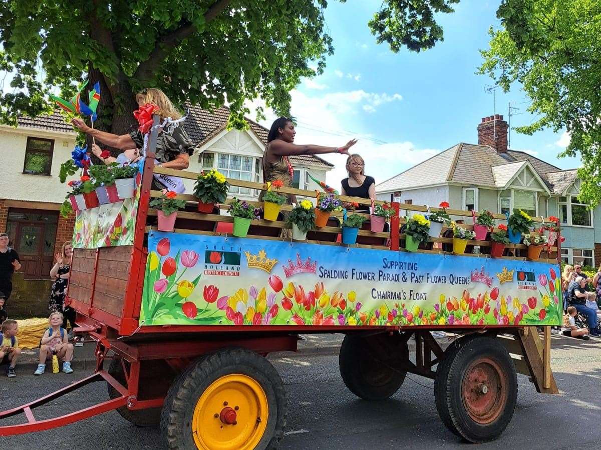 Former Flower Queens give a wave