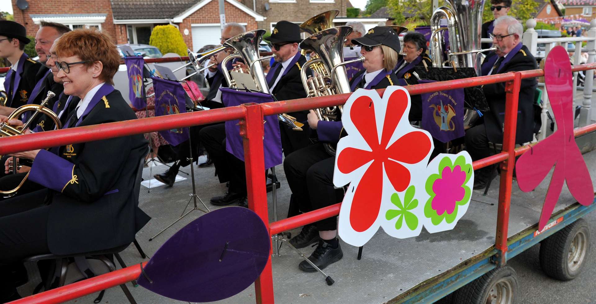 The band plays on a float