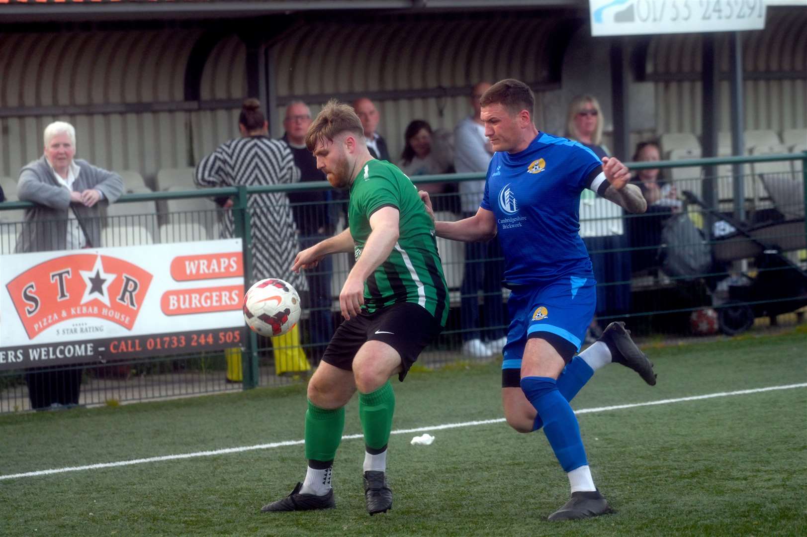 March (Blue) v Blackstones (Green and Black) in the final of the Hinchingbrooke Cup Craig Gillies