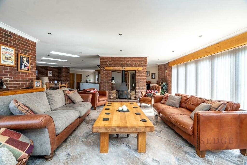 The living area has a lovely fireplace