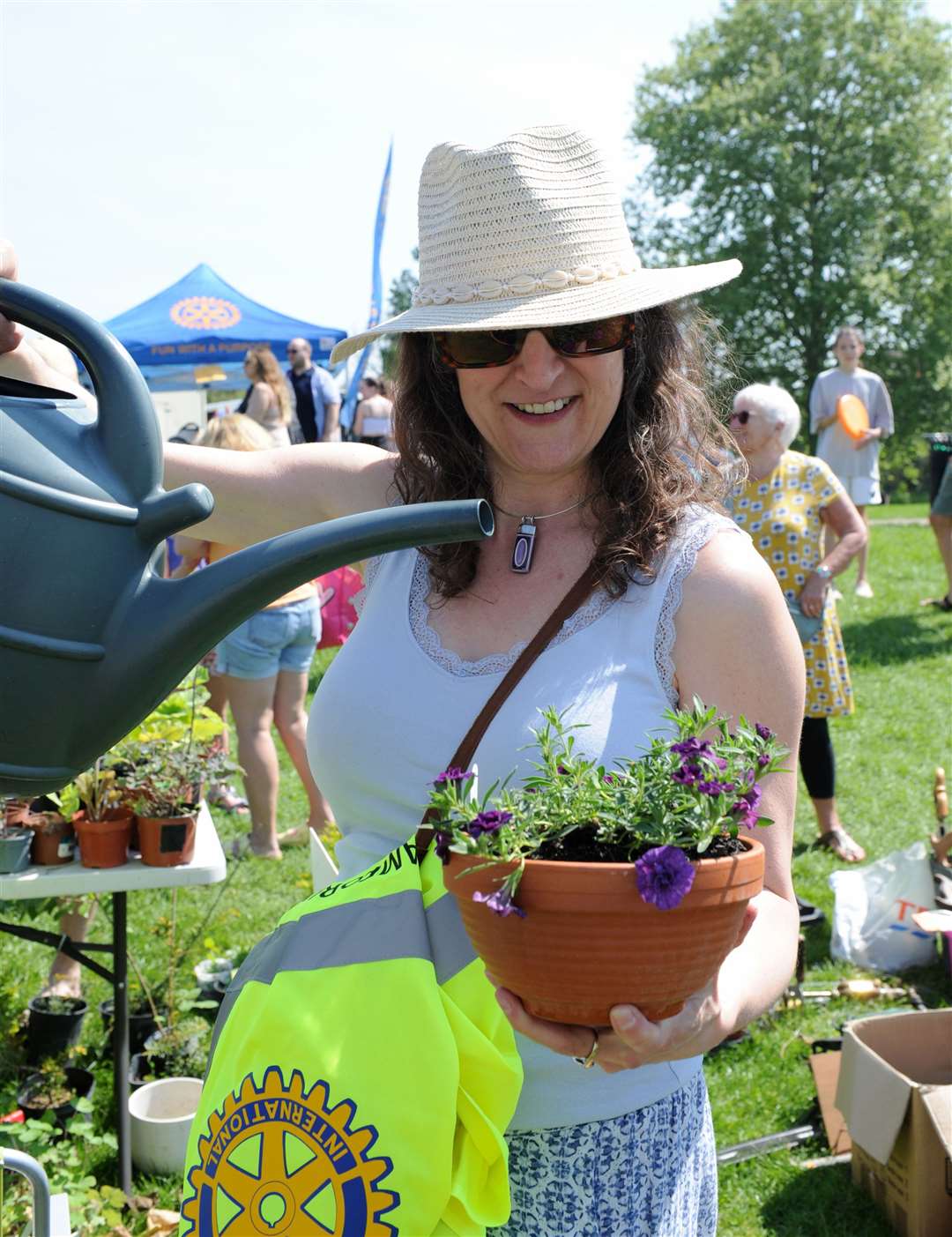 Emily Payne waters the plants. Photo: Chris Lowndes