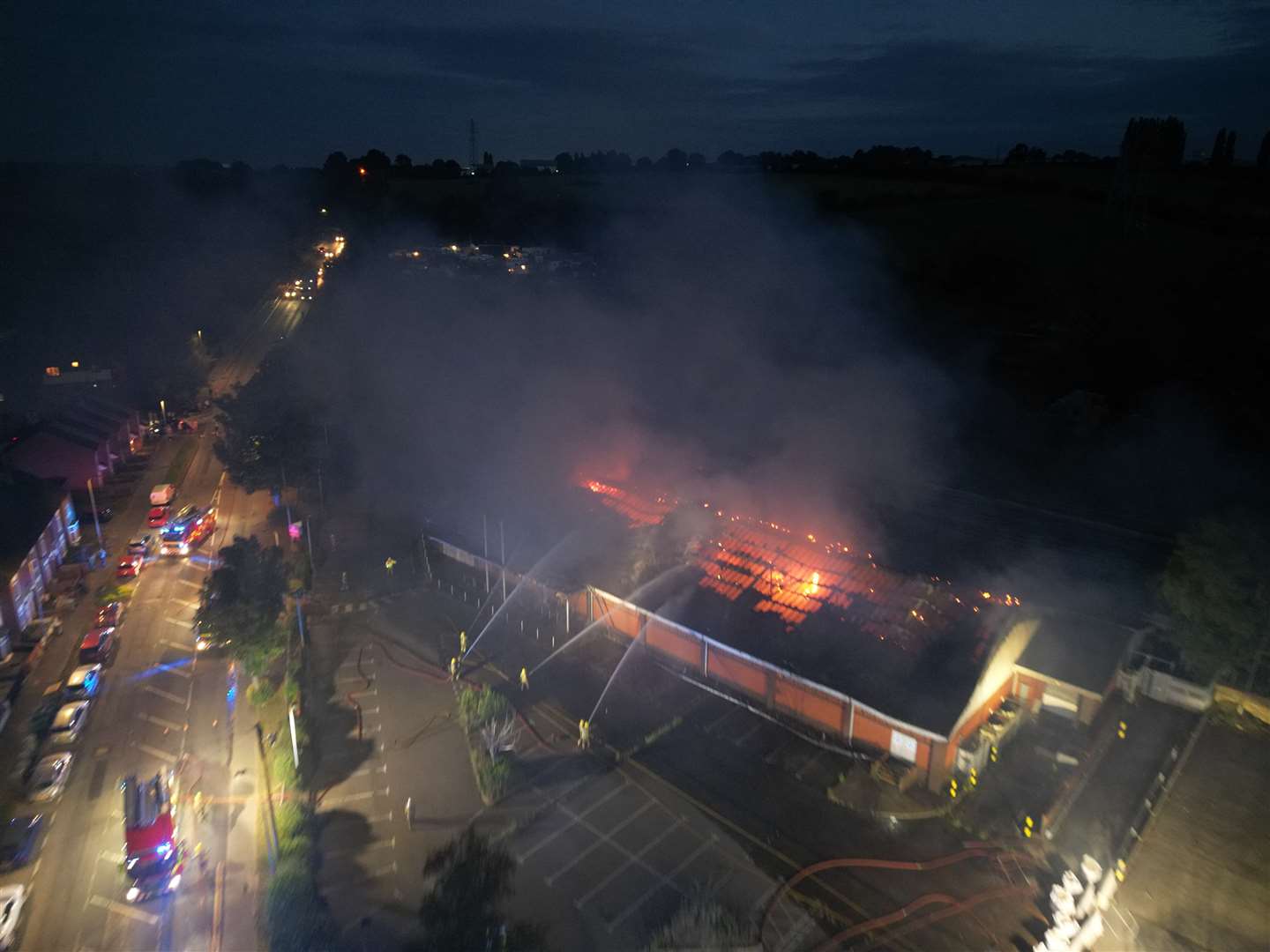 Drone photos show the extent of the fire at the former Aldi store. | Photo: Jake Harris