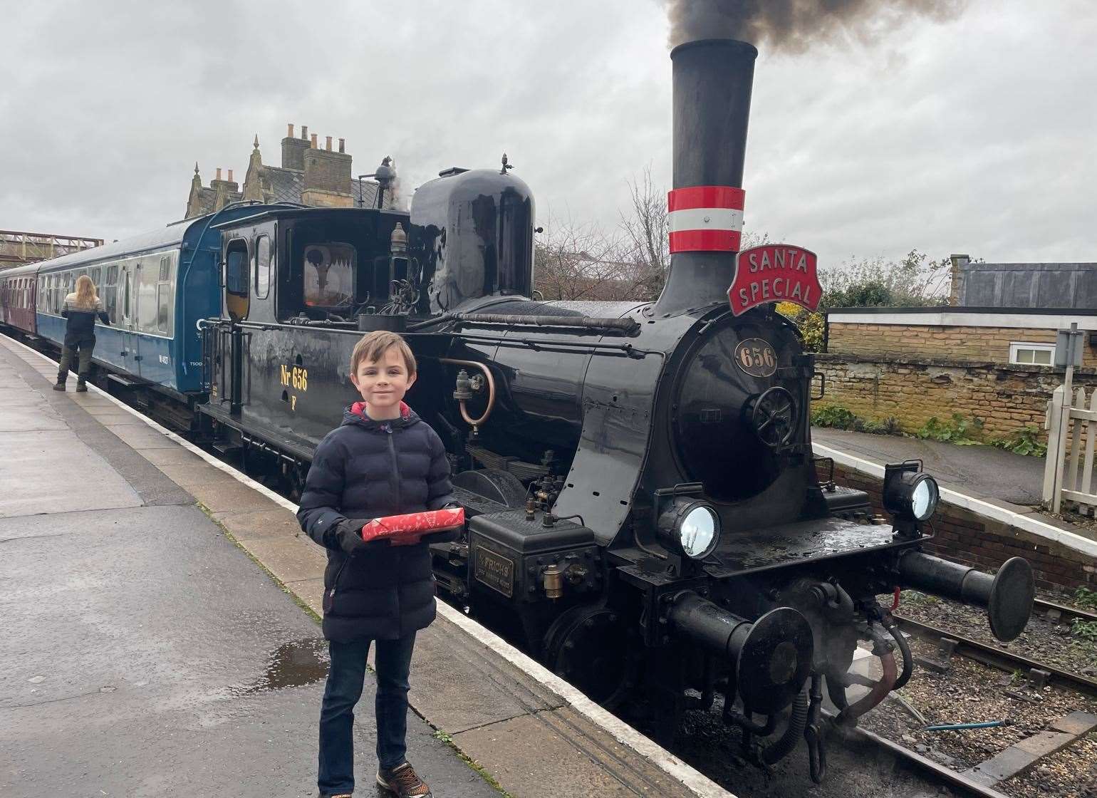 With gift before boarding the Santa Special