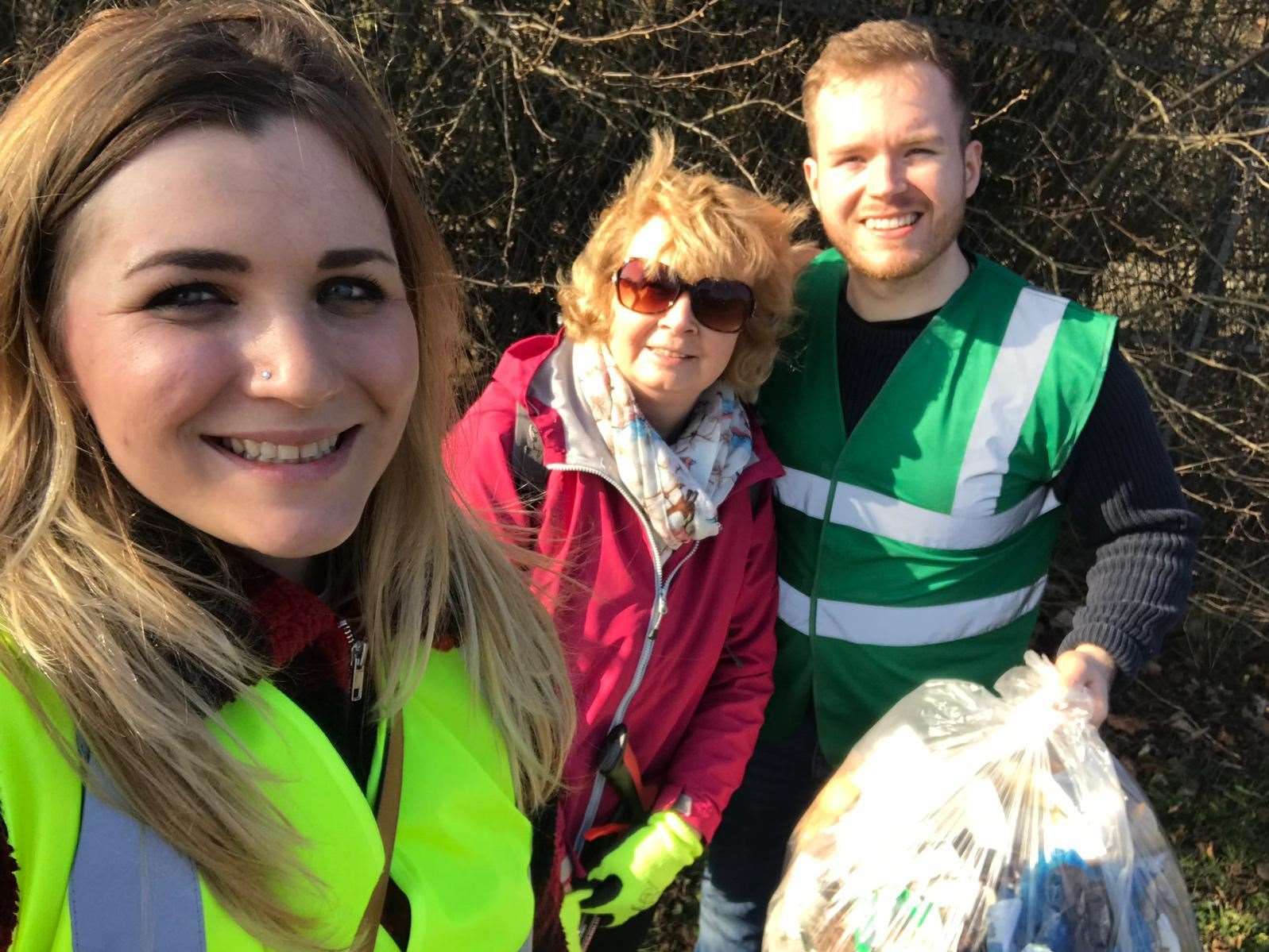 Alistair Crisp and his team collecting the disposable gloves which had littered the area near the Sainsbury's filling station in Spalding. (7907371)