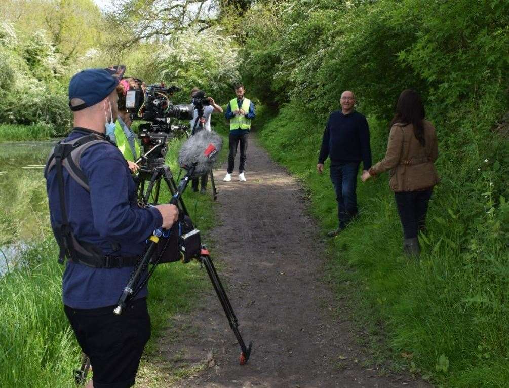 Show presenter Ginny Buckley interviews project manager Paul Dadford on the towpath. Photo: Stephanie Ross