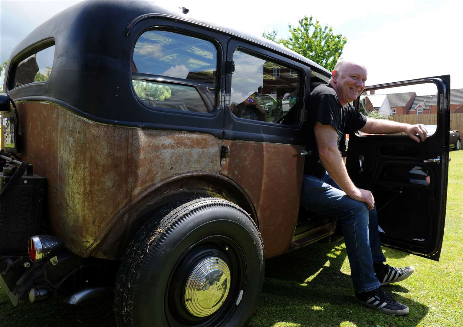 Mark Aspinall, from Morton, with his stunning 1933 Hilman Minx. Photo: Iliffe Media