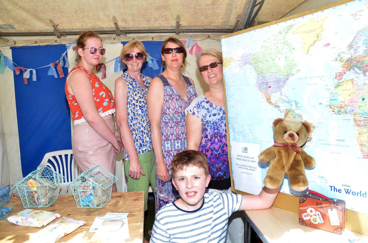 Holbeach WI's where in the world is the bear game with Amy and Carol Wilson, Lisa Hearne, Sarah Pease and (front) Nicholas Hearn. Photo: 010718122SG.