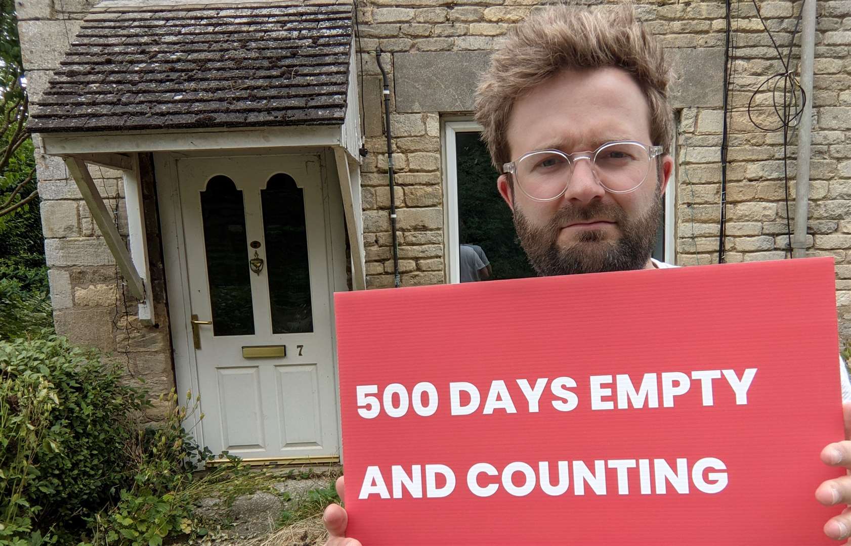 Ben Green in front of the empty council house