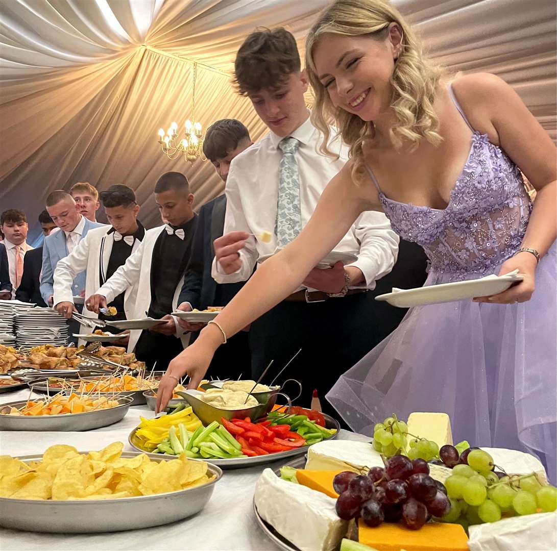 Tucking into the buffet at the prom
