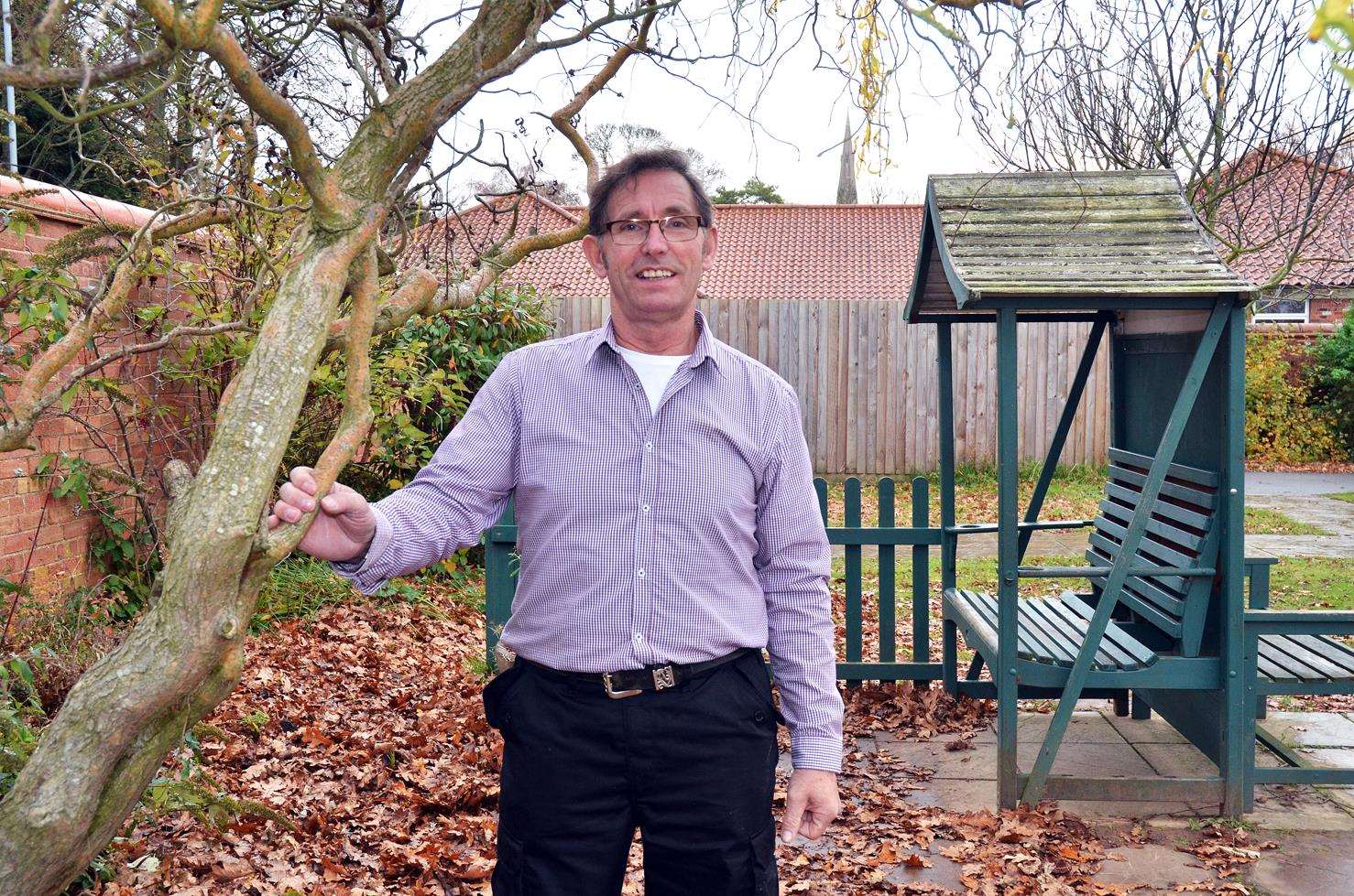George in the memory garden he helped create at the school. (5530133)