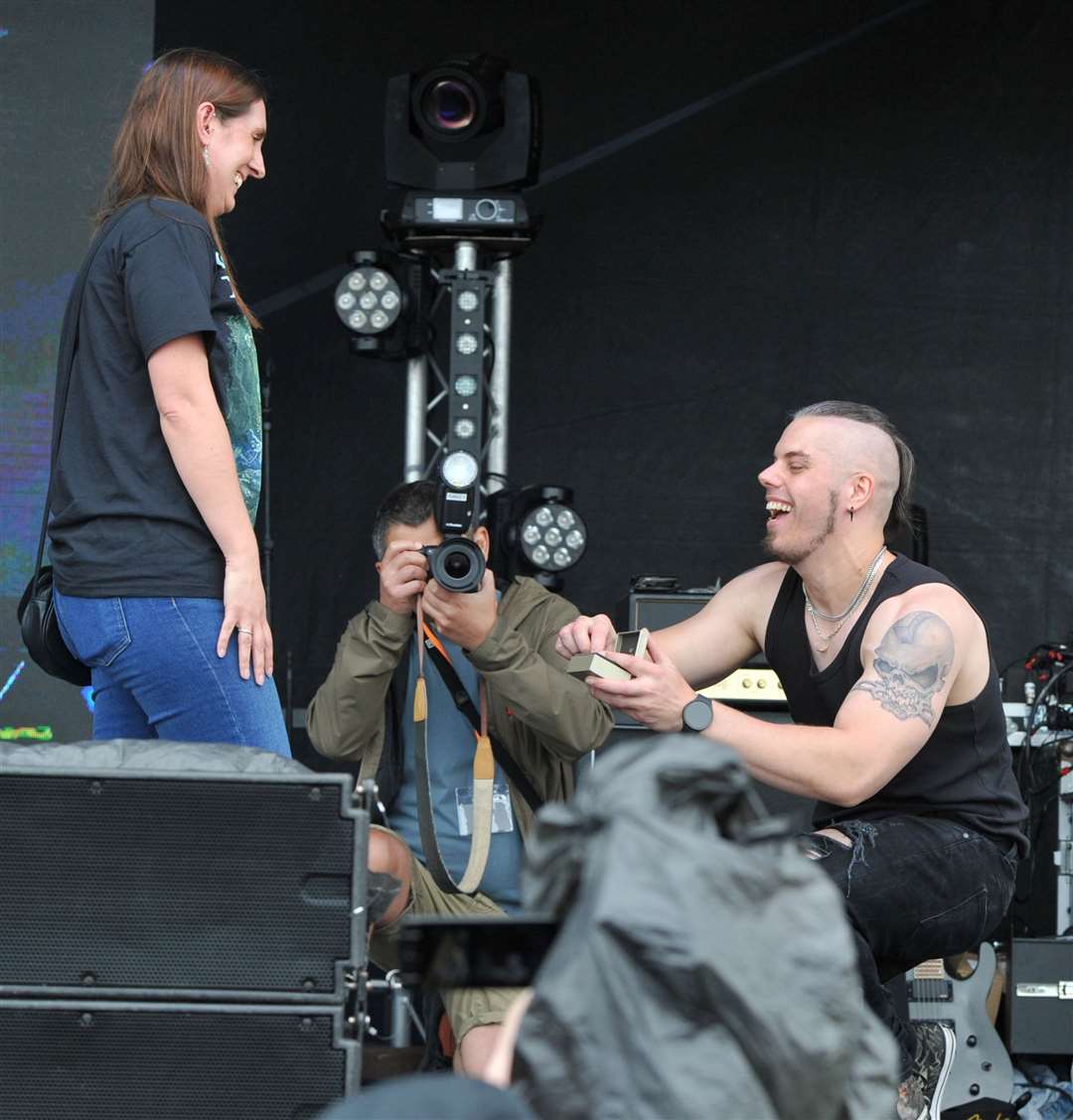 Delfinia drummer Carl Sheldrick proposed to Candice Clarkson on stage