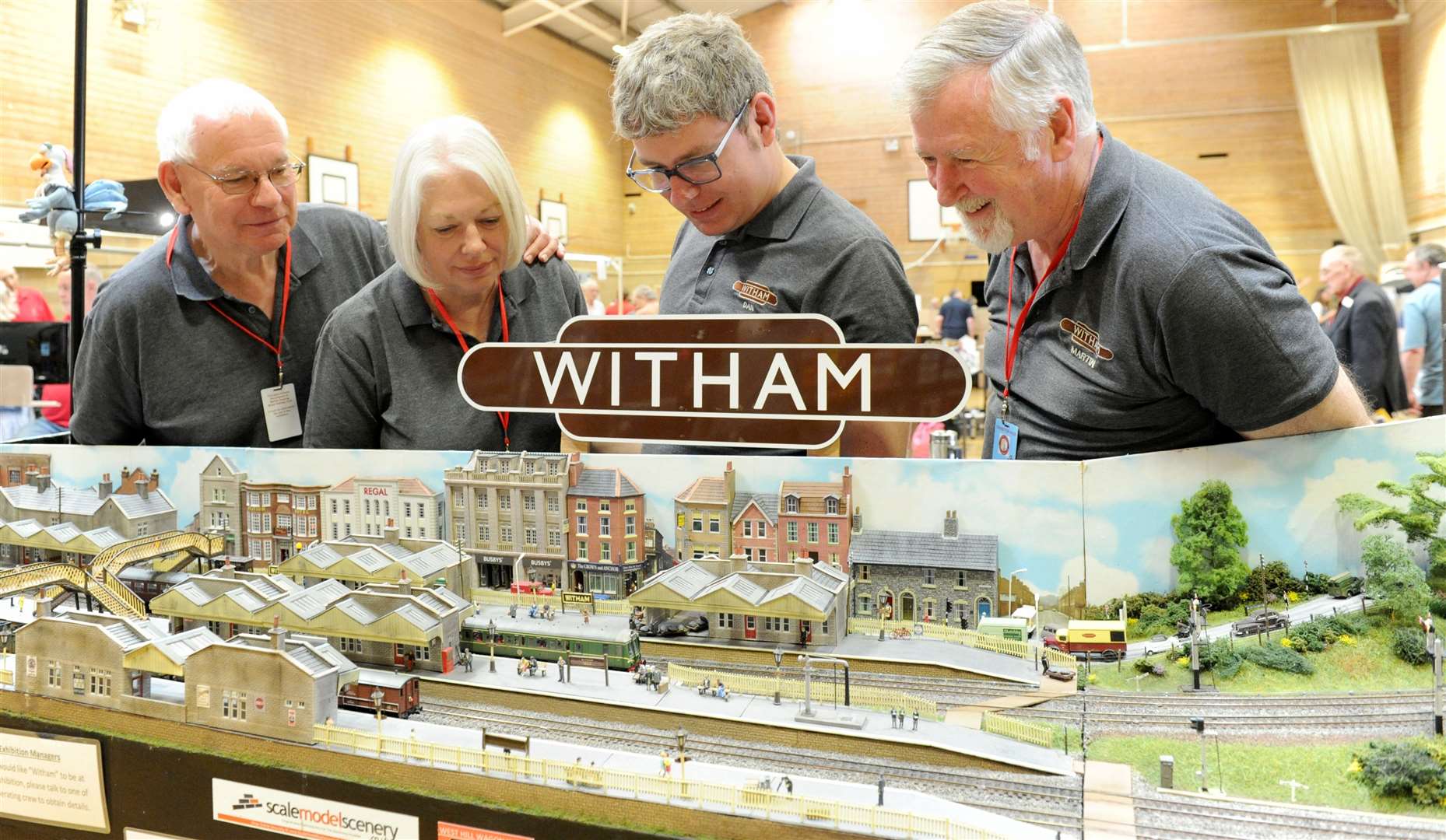 Steve, Kath and Dan Back, and Martin Reynolds look at the layout Witham, Somerset. Photo Chris Lowndes