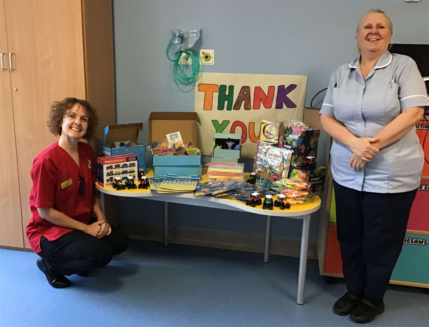 Hospital staff with the donations from Dynamics Cleaners.