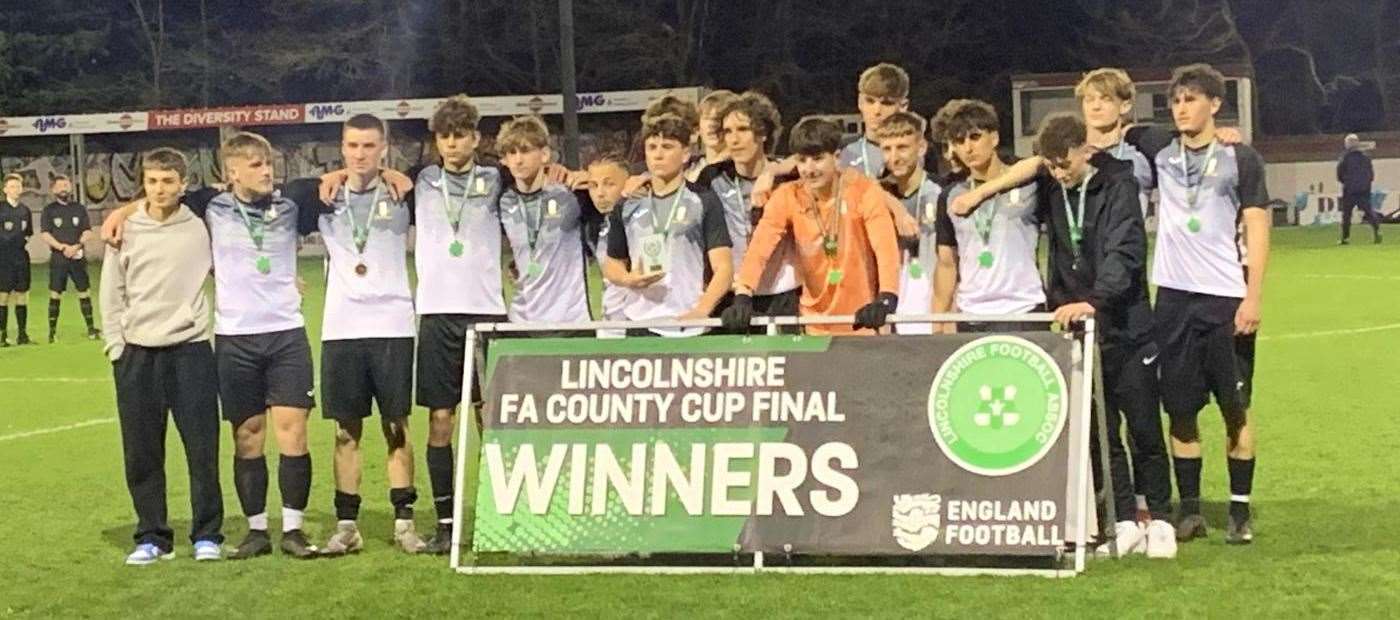 Grantham Town Under 16s celebrate their success.