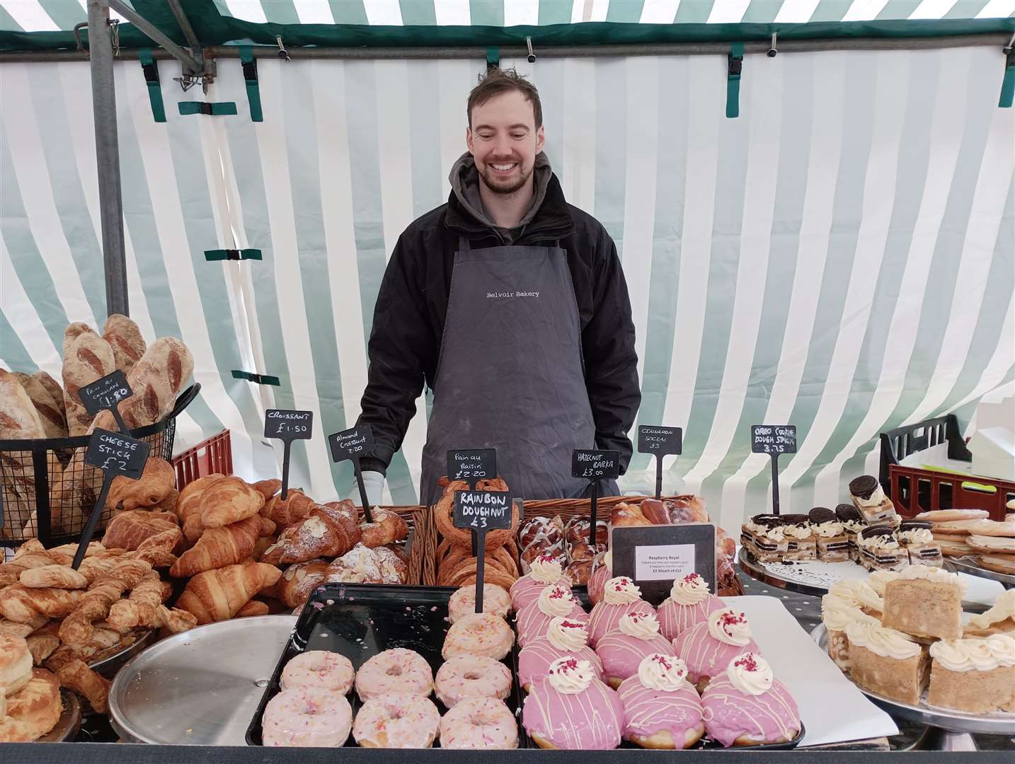 Jake on the Belvoir Bakery stall at Grantham Market.