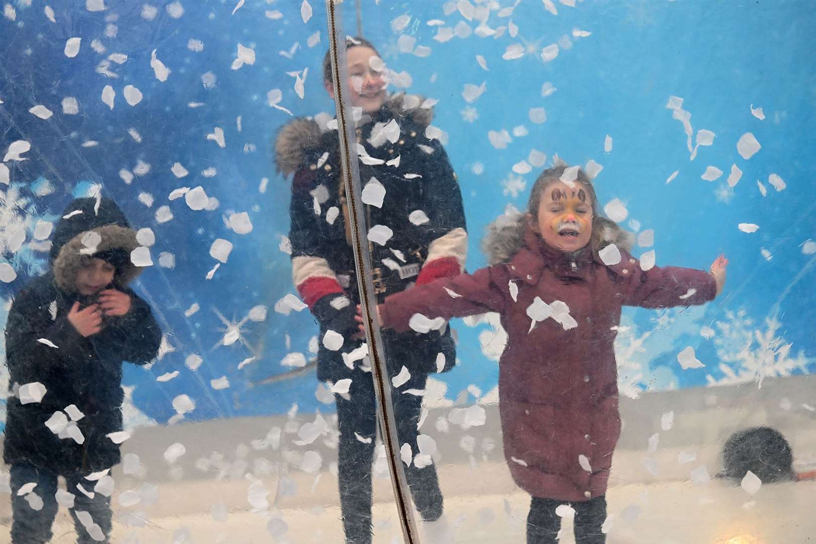 Children enjoying the Christmas fair.
