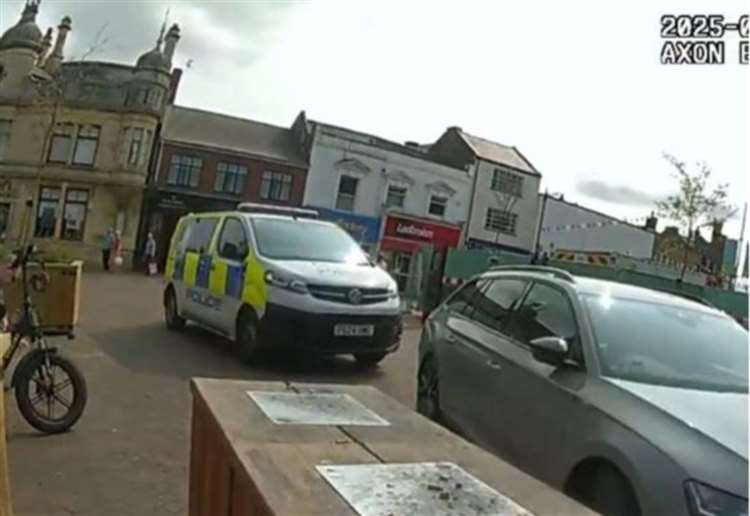 Man arrested in town centre after firearm reports