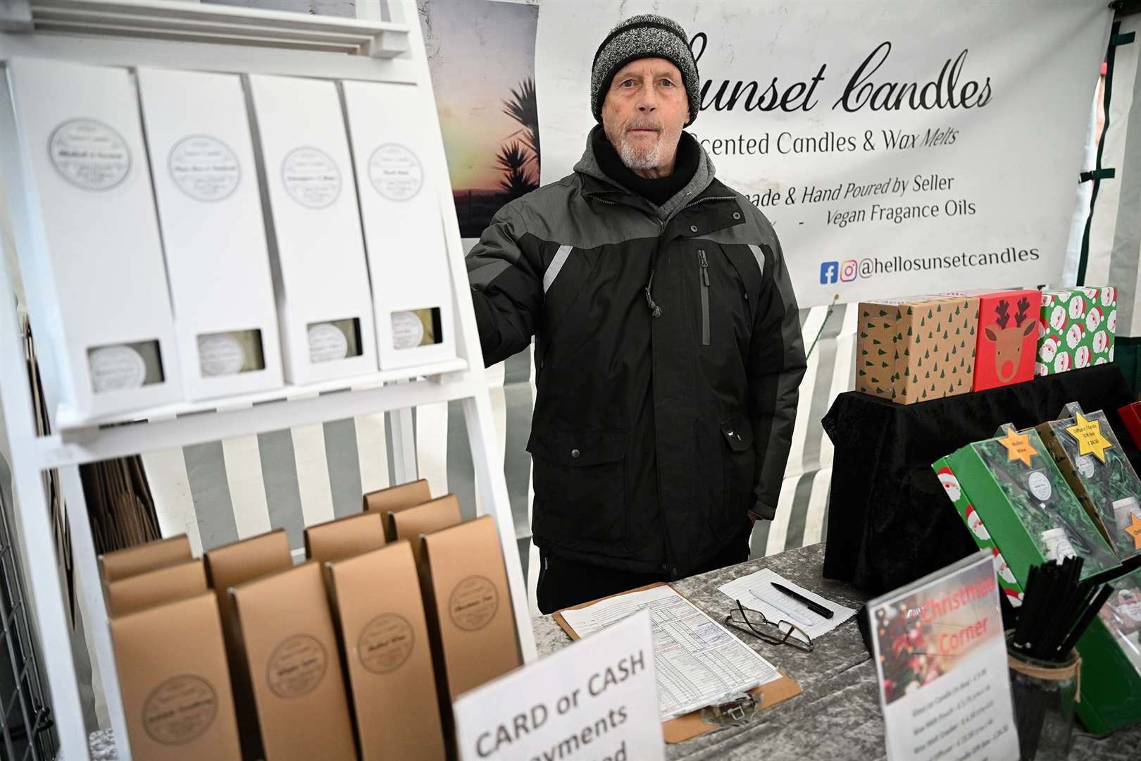 John Griffiths at Sunset Candles stall.