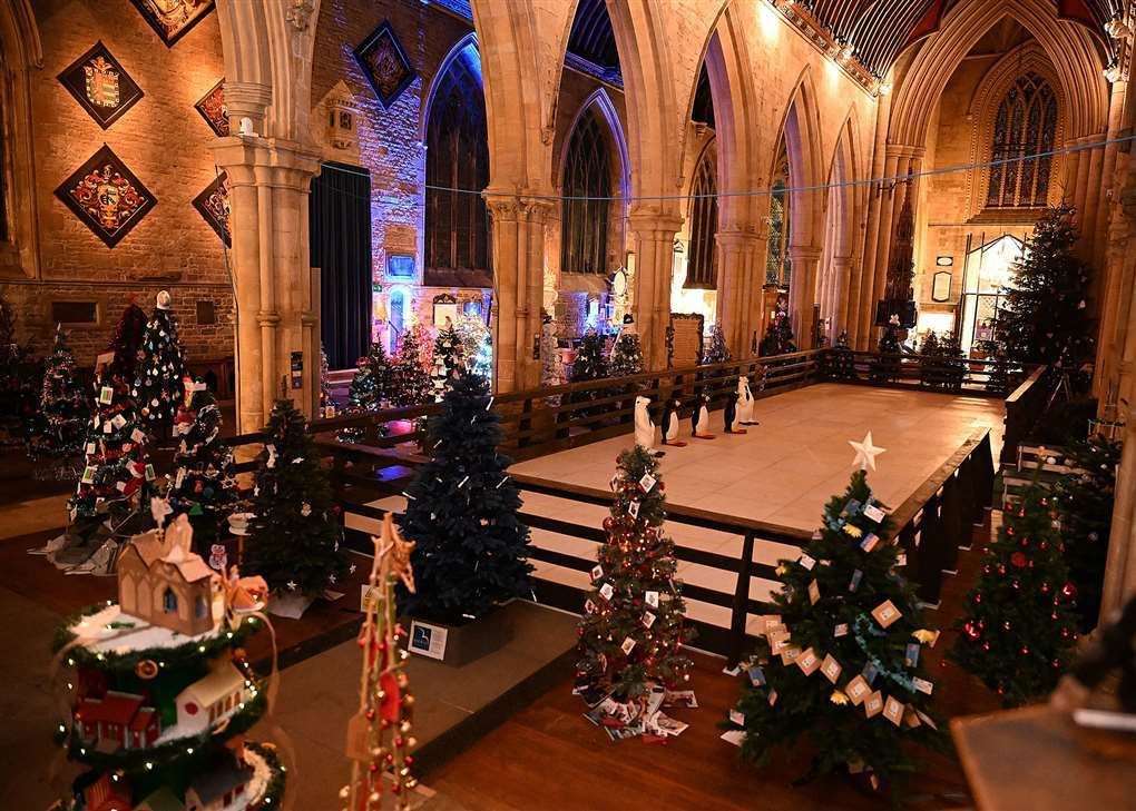 Christmas trees surround the skating rink at the 2022 festival.