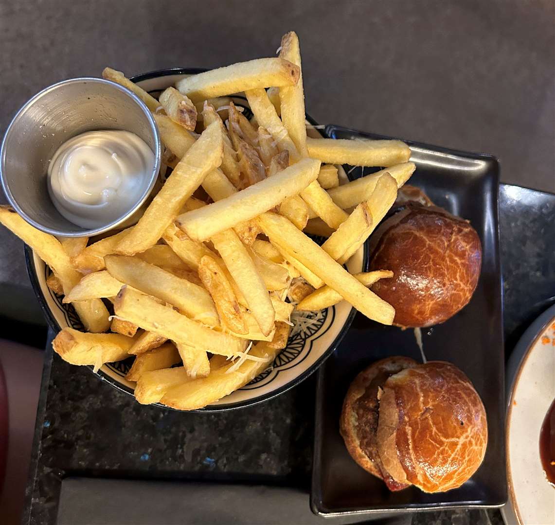 Parmesan fries with truffle mayo and the beef sliders which included Monterey jack cheese, spicy mayo and braised tomatoes