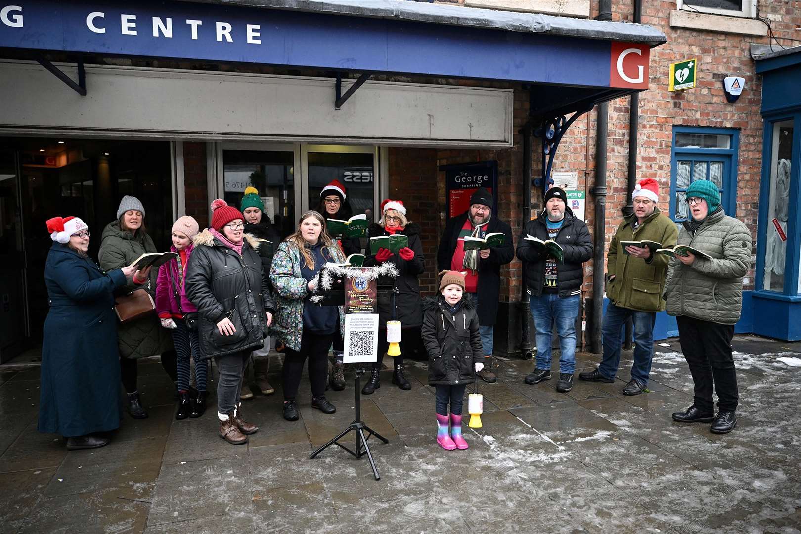 Carol singing to get into the Christmas spirit.