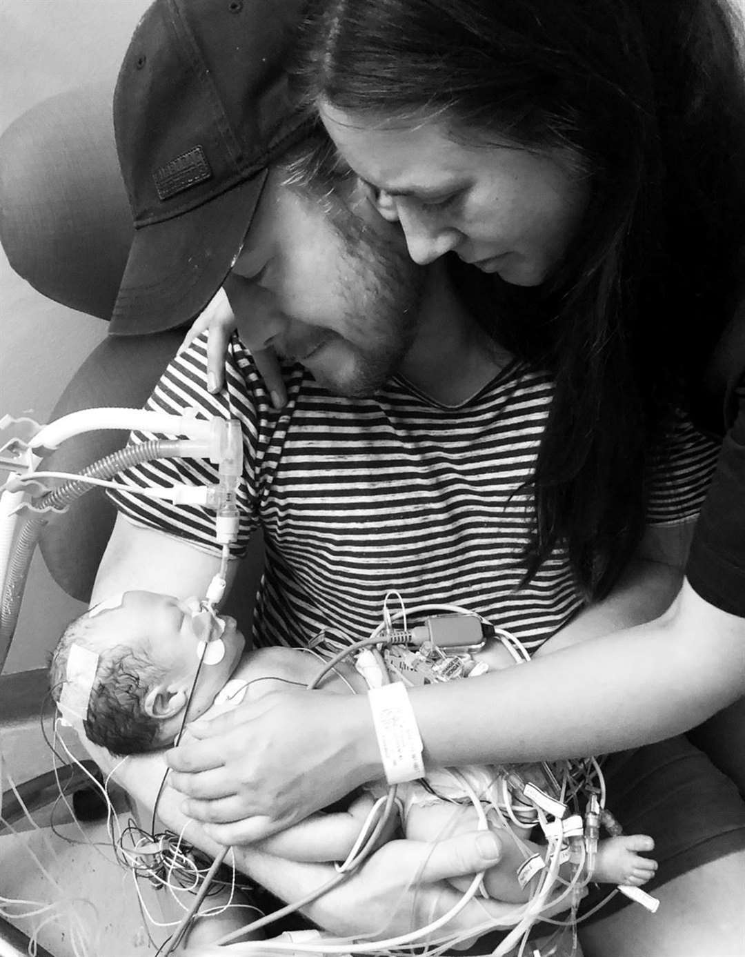Ryan Parker and Emmie Studencki with baby Quinn (61335231)