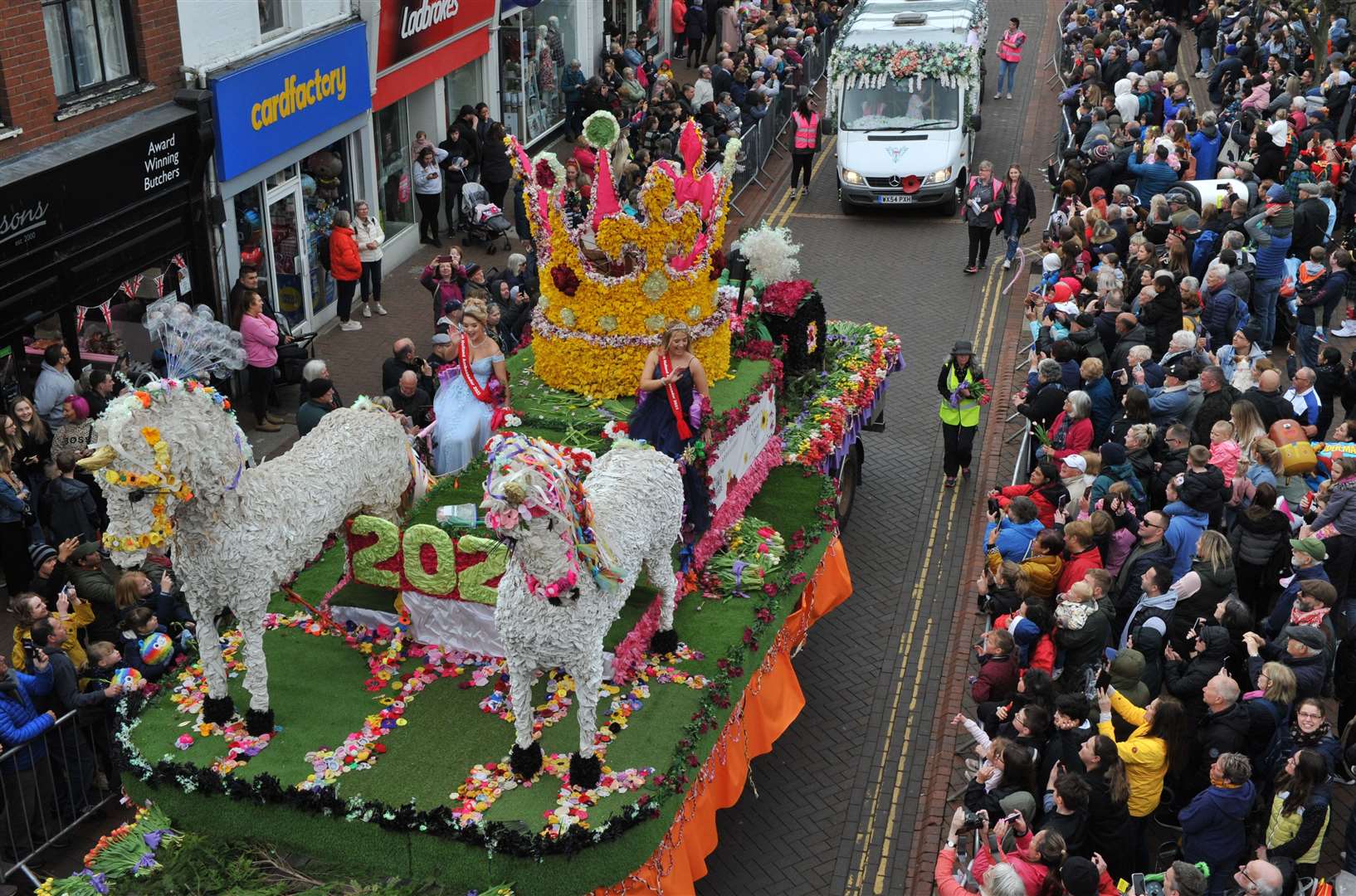 The ambassadors' float makes its way through the crowds in Spalding town centre