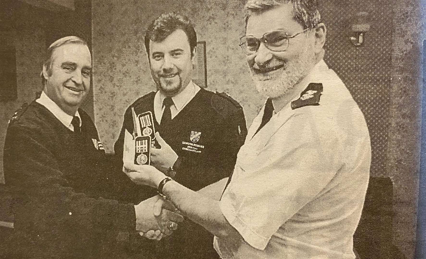 Medals for the Boys in Blue - the long arm of the honours Special Constables Dave Hinson and Nigel Garwood for their long-service in the fight against crime 25 years ago.