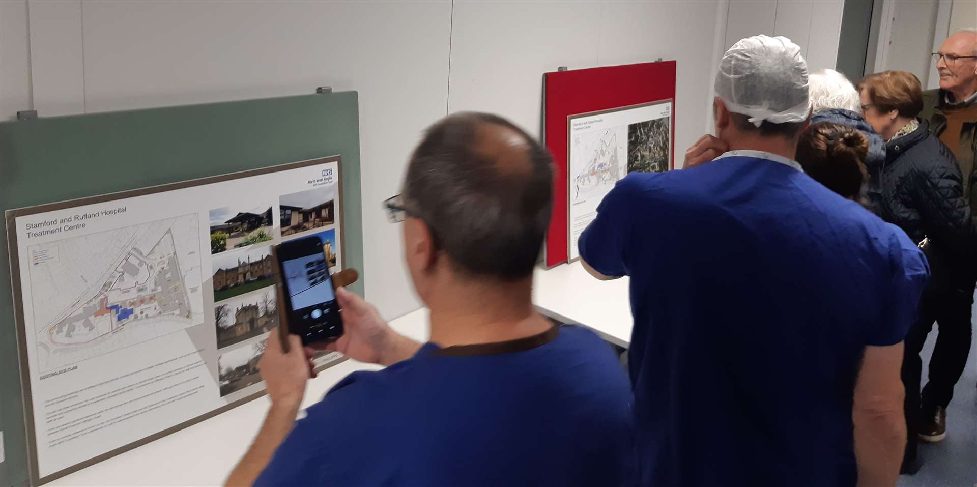 Staff take a look at plans for the new treatment centre