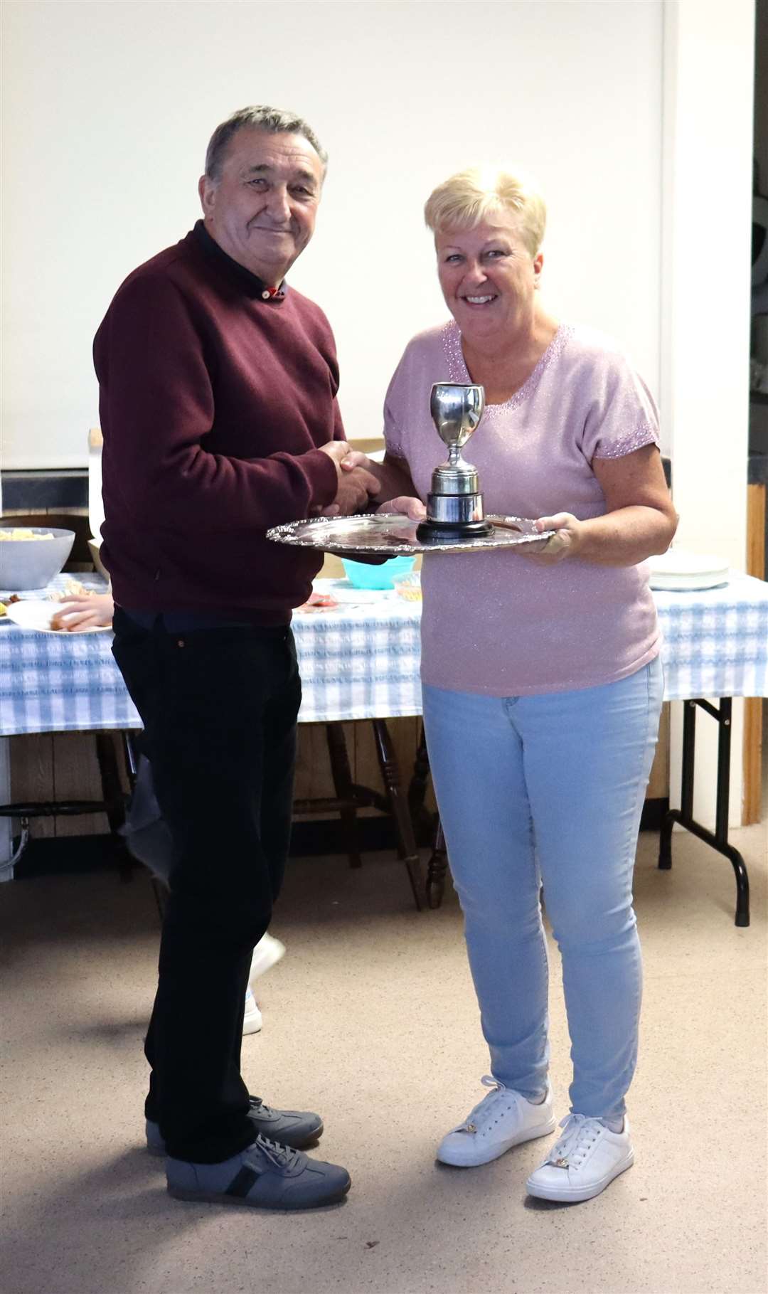 Alan Cox, pictured with Commodore Sarah Prior, won the Lowland Trophy and the Munson Cup.