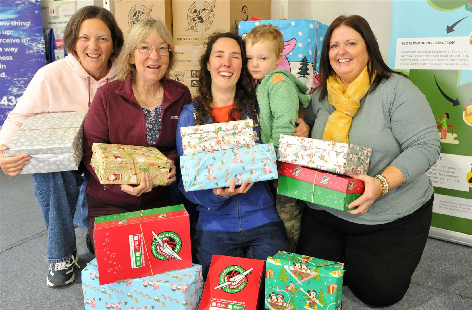 Suzanne Johnson, Gill Day, Madeleine Gilbert, Timothy Gilbert and Julie Sugden with some of the boxes. Photo: Chris Lowndes