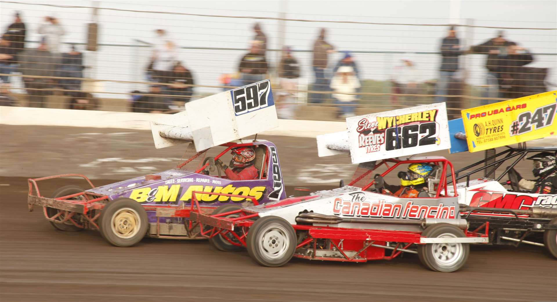 Spalding F2 Stock Car drivers Barry Clow and Steve Wycherley battle for supremacy on Saturday night. Photo: Dave Bastock