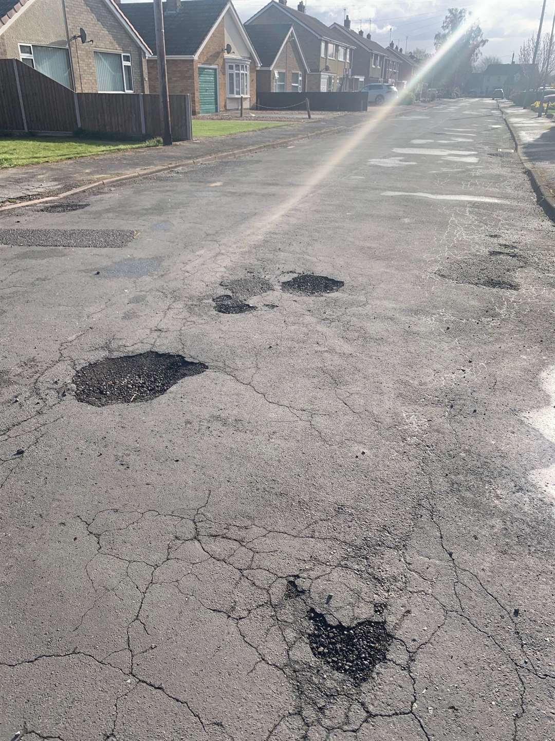 Potholes in Churchill Drive, Spalding are set to be patched up by the summer (45557455)