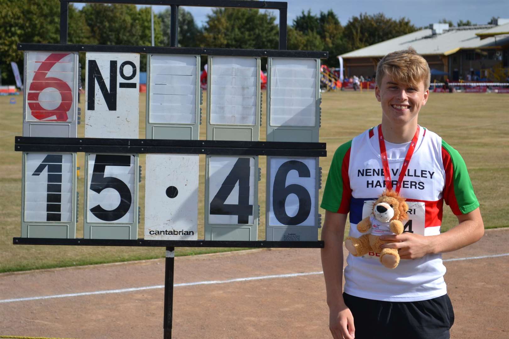 Donovan Capes next to his winning shot put distance at the England Athletics Under-15/Under-17 Championships in September.