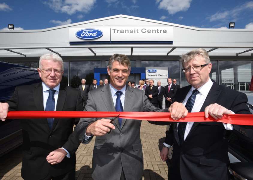 Opening the new centre are, from left, Terry Rayner from Ford, James Harrison, chairman and Billy Fitch, group business centre manager. EMN-150505-182705009