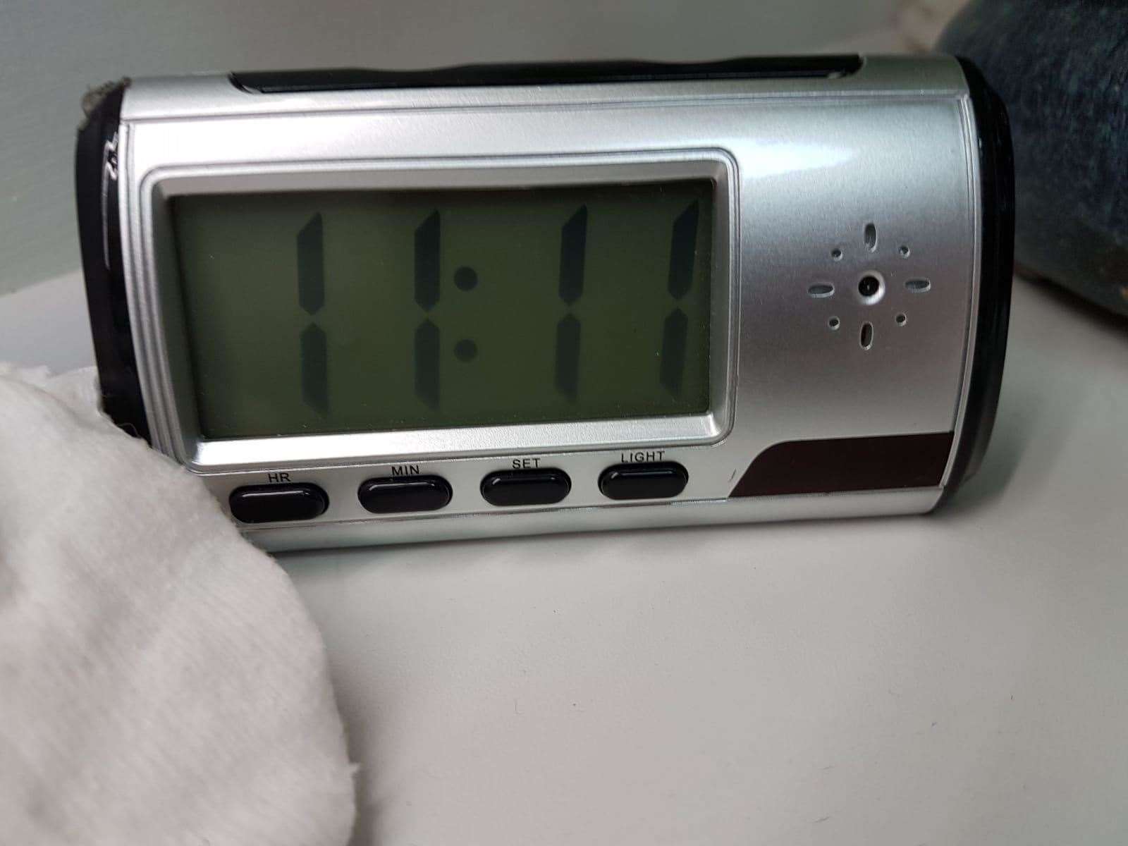 Glover's camera was disguised as an alarm clock (63264657)