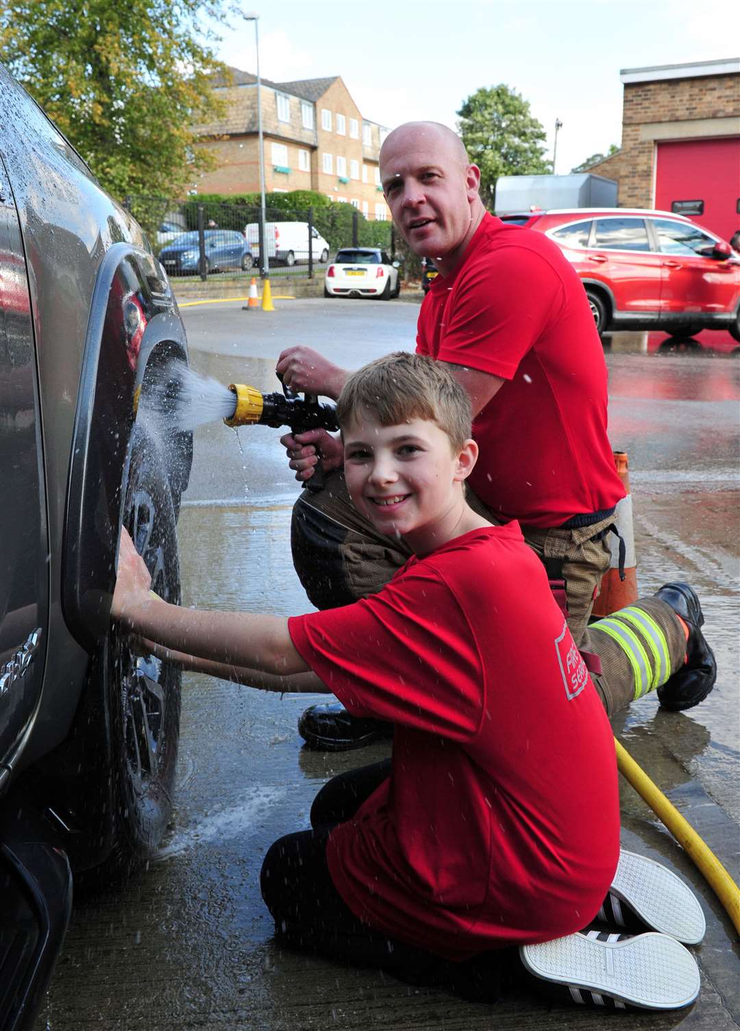 Alfie Topaz, 11, gives Hayden Johns a hand