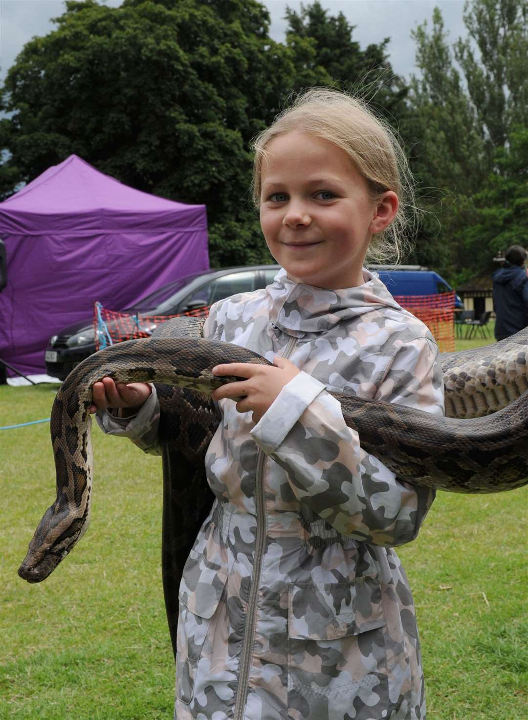 Florence Fraser-Betts with a snake on show. Photo: Chris Lowndes