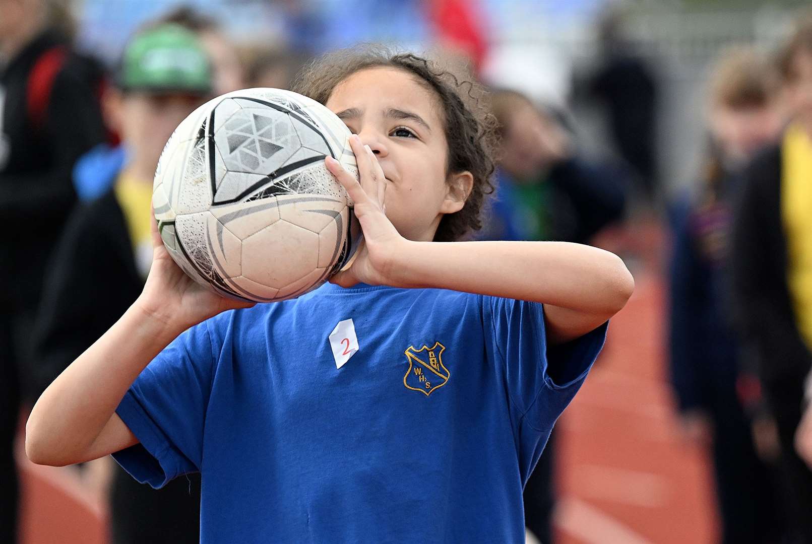 This girl shows off her throwing skills on day one.