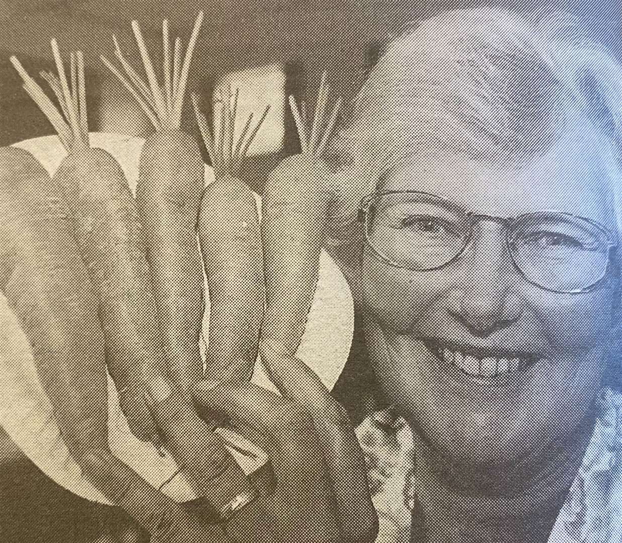 Jessie Goodacre with a plate of prize winning carrots 25 years ago.