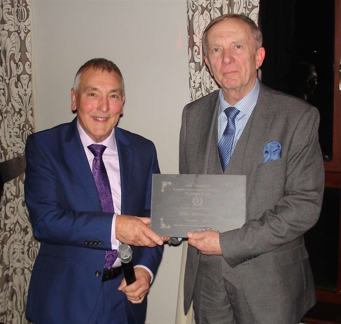 The presentation of recognition of continual and invaluable service to the seniors group to Mike Whitington.