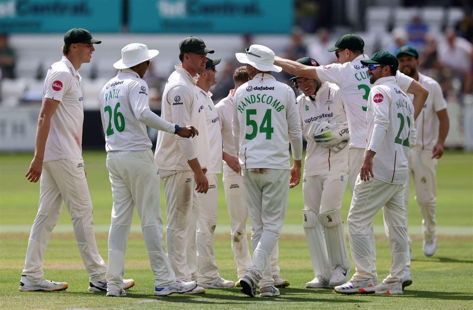 WICKET - Peter Handscomb is congratulated for a slip catch to dismiss Fynn Hudson-Prentice on Day 1 of the Vitality County Championship Two match between Sussex County Cricket Club and Leicestershire County Cricket Club at the 1st Central County Ground, Hove, United Kingdom on 23 June 2024.