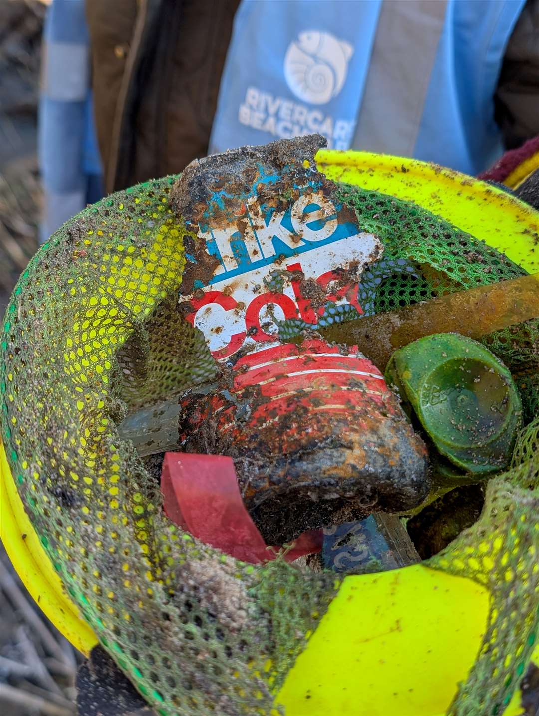 Part of an old Strike Cola can