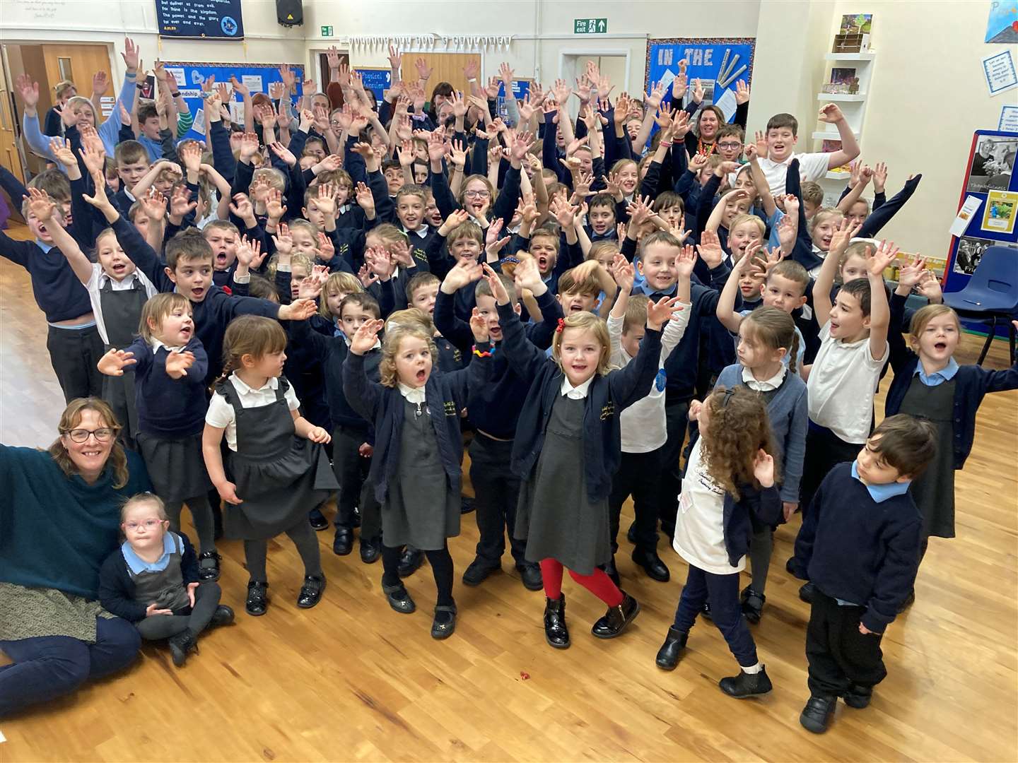 Staff and pupils are delighted after their school was described as 'outstanding' in all areas by Ofsted inspectors.